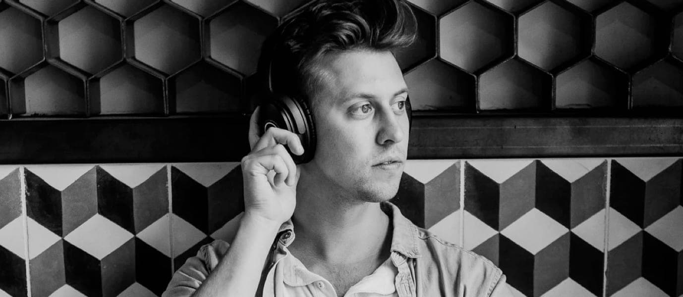 Man wearing XX99 Mark 2 headphones